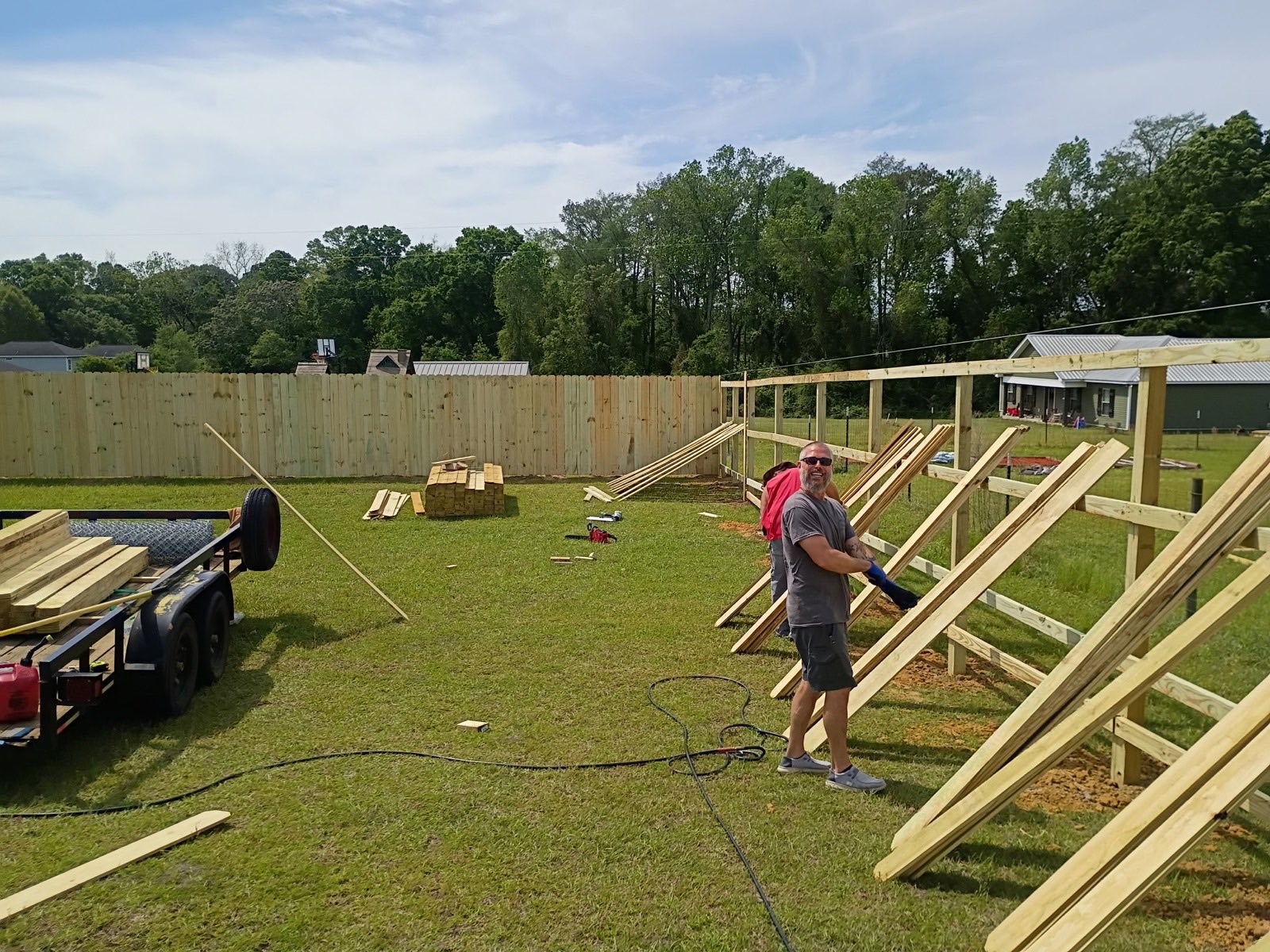 Freshly built wood fence section showcasing clean craftsmanship